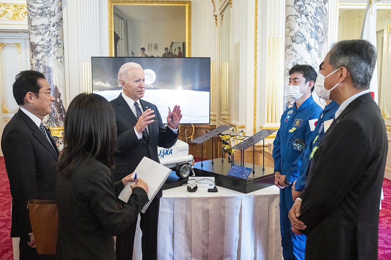 President Biden viewing a lunar rover.