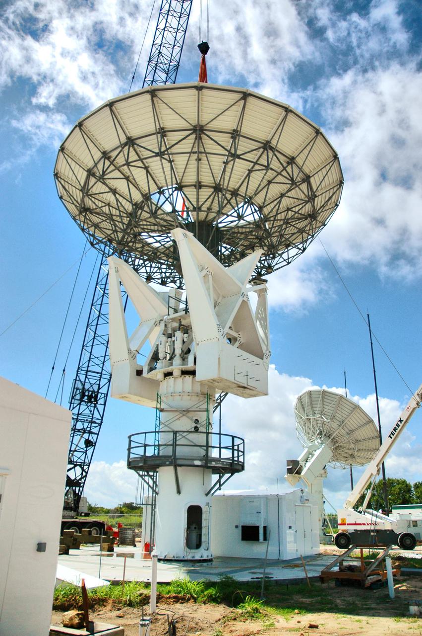 50-foot C-band radar antenna dish being lowered.
