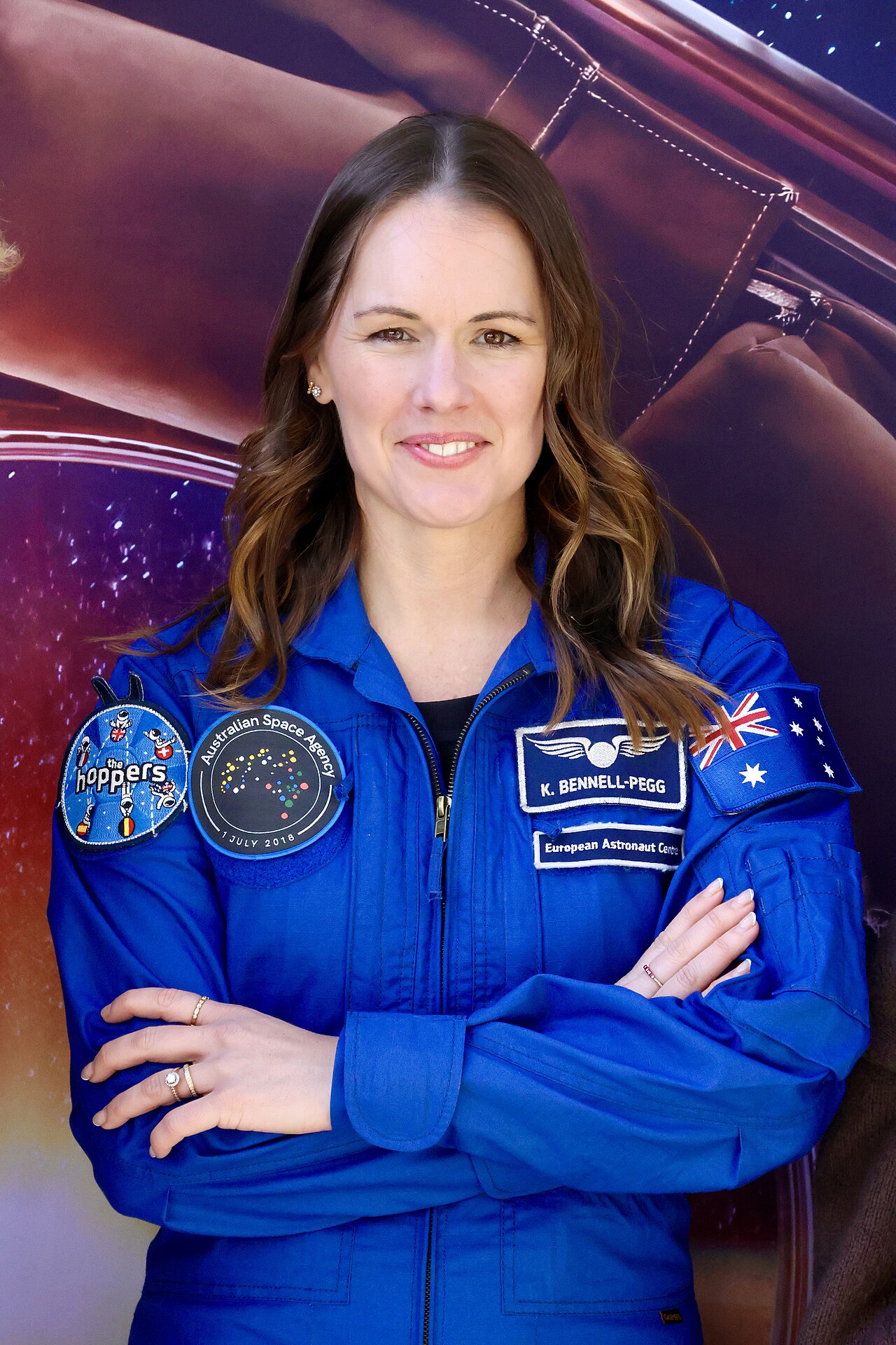 Astronaut Katherine Bennell-Pegg speaking at an event.