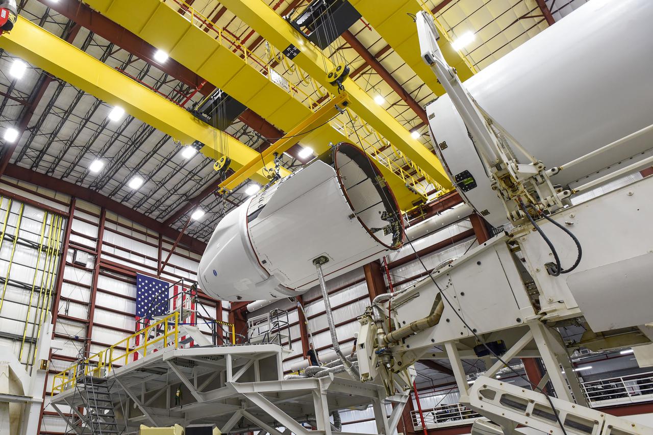 SpaceX Cargo Dragon spacecraft mated to a Falcon 9 rocket.