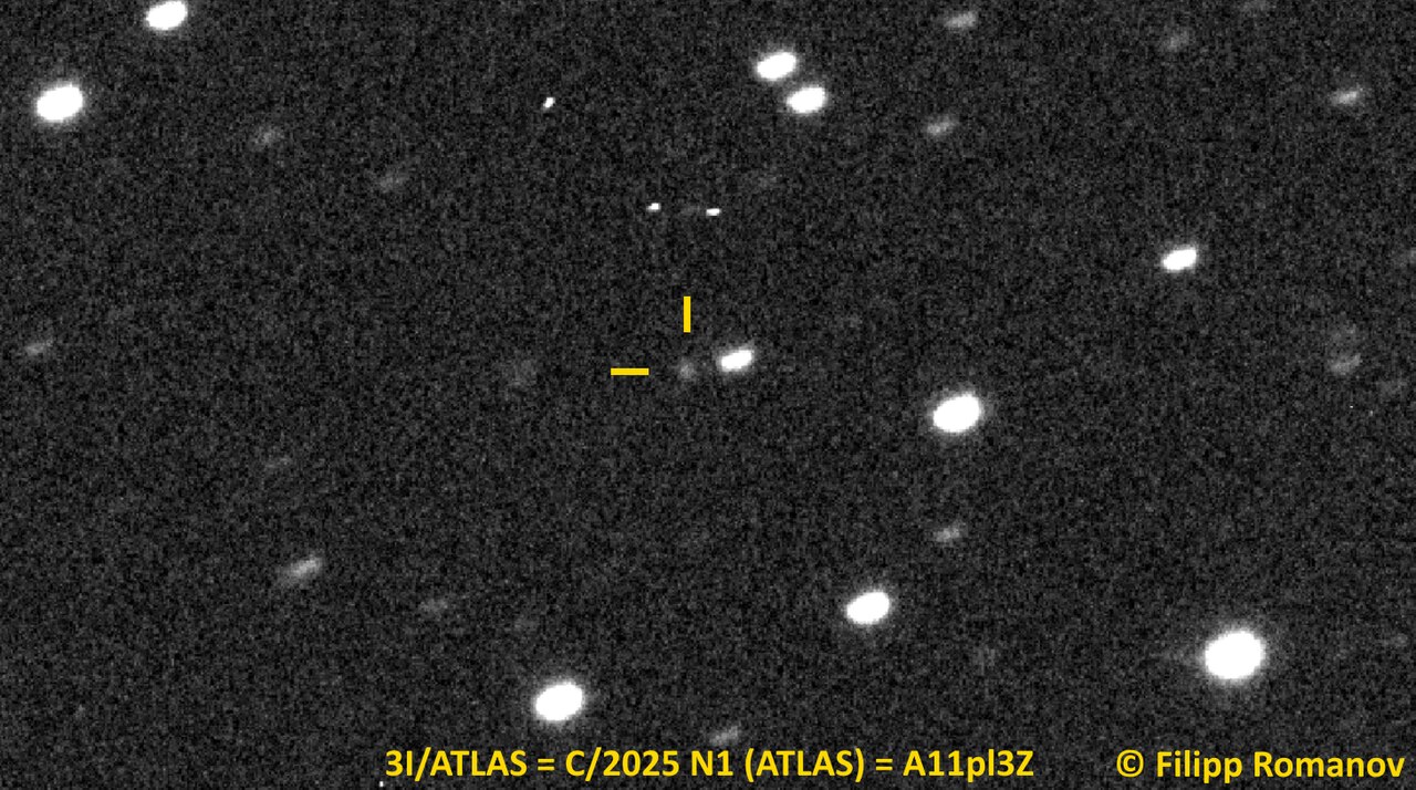 An image of Comet 3I ATLAS, showing its coma and tail against a starfield.