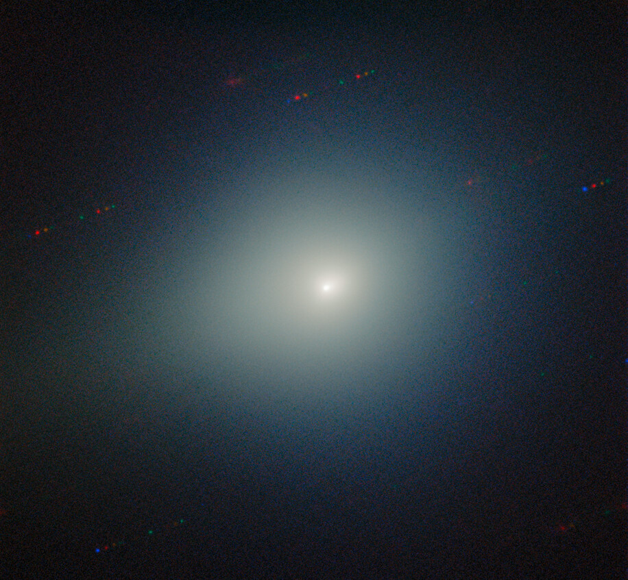 Comet 3I/ATLAS streaks across stars and galaxies in this image.